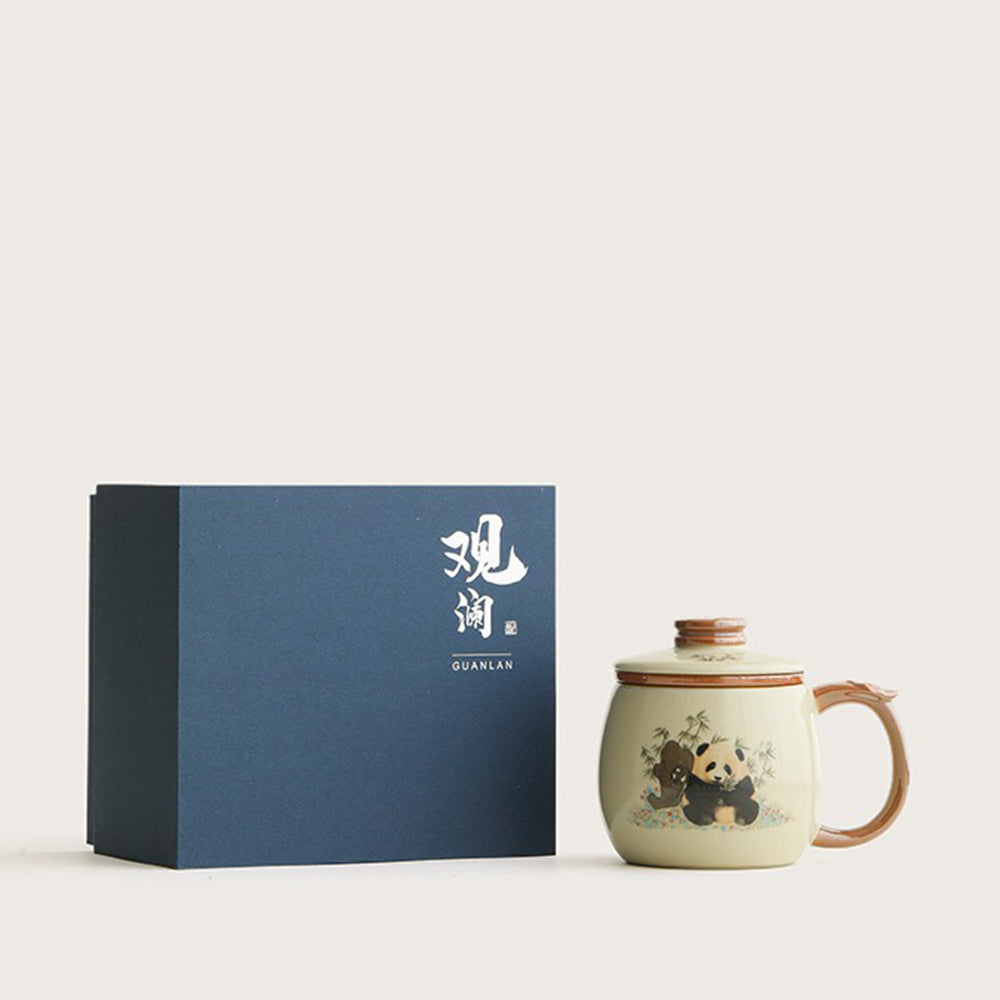 Handmade Ruyao ceramic tea mug in use, perfect for enjoying loose leaf tea.