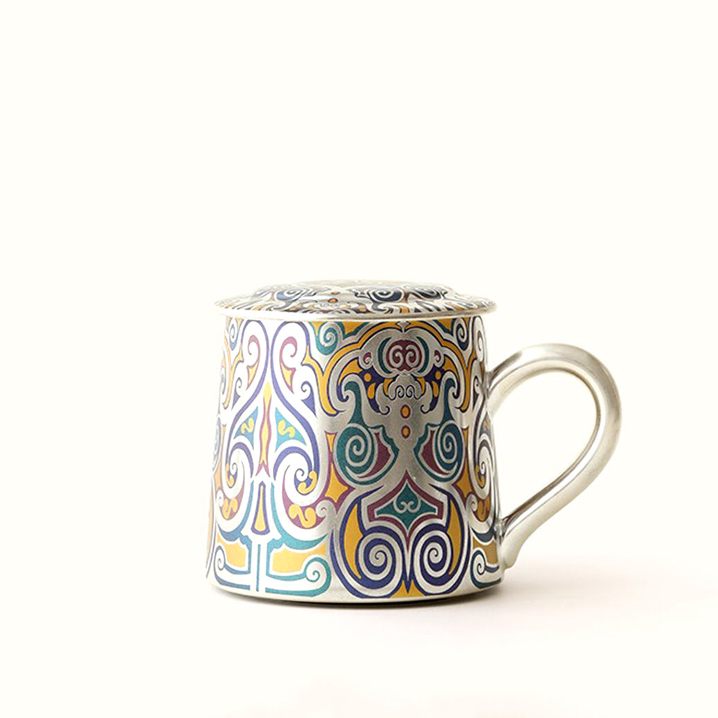 Close-up of Dunhuang painted patterns on silver plated ceramic tea cup