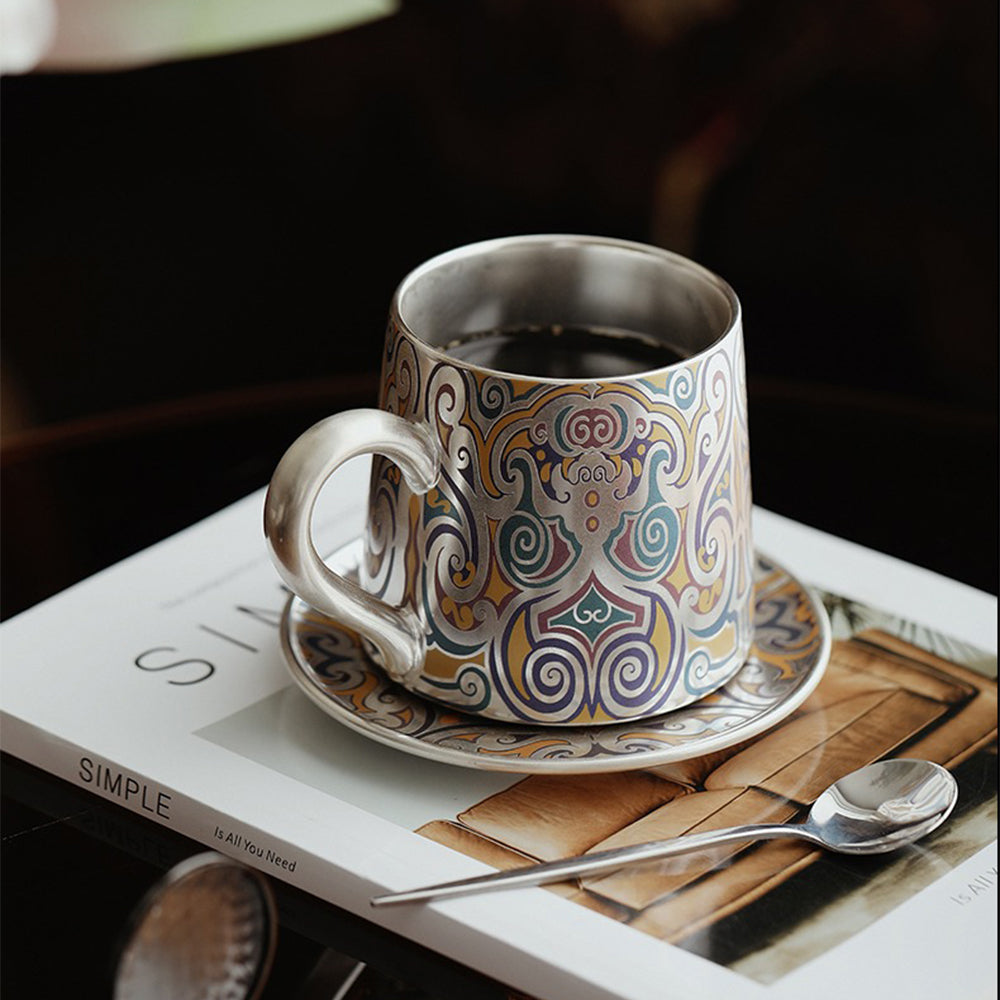 Close-up of Dunhuang painted patterns on silver plated ceramic tea cup