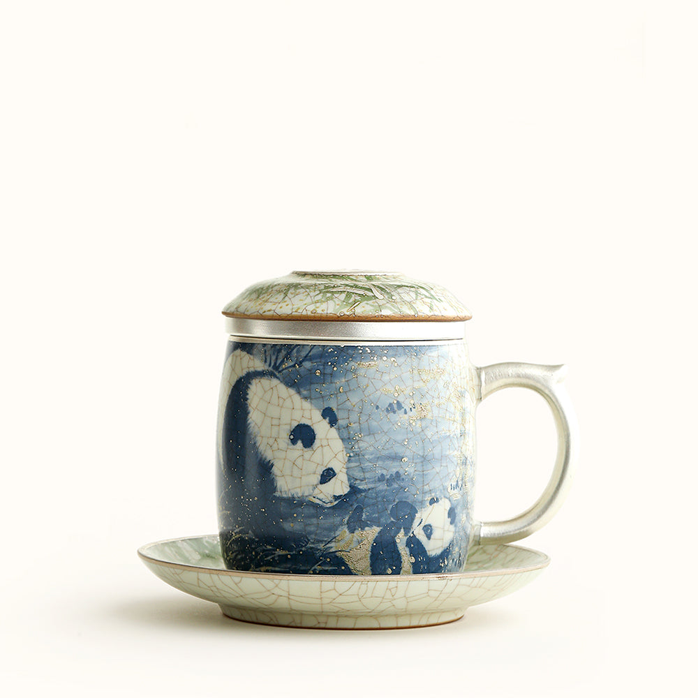 Close-up of panda and bamboo pattern on ceramic tea cup with glaze details