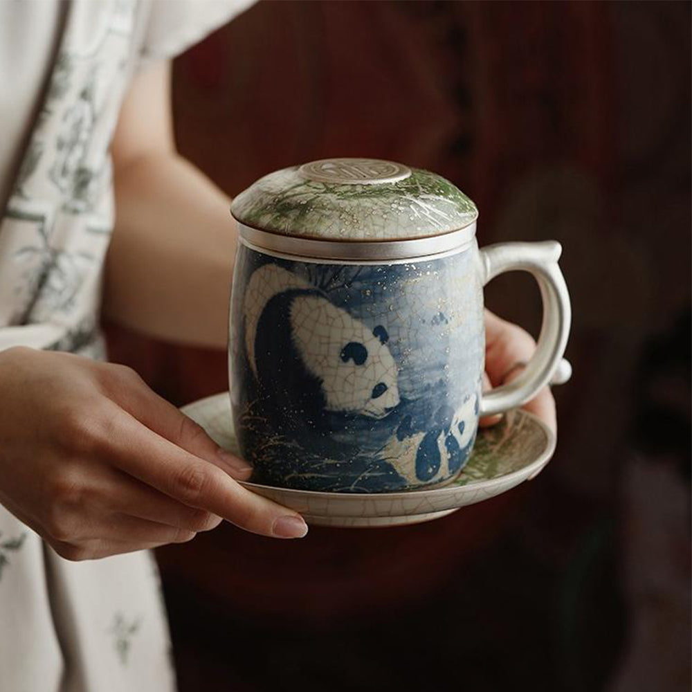 Side view of panda cup showing ergonomic handle and lid design
