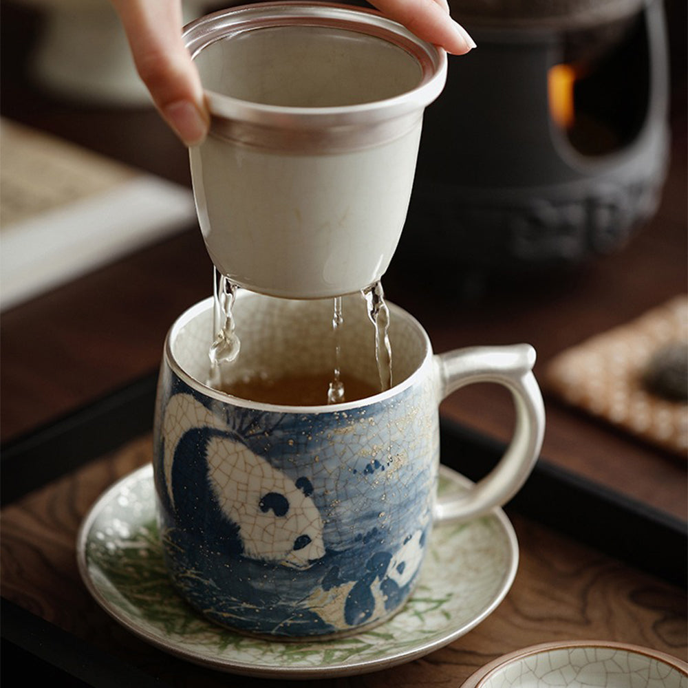 Close-up of panda and bamboo pattern on ceramic tea cup with glaze details