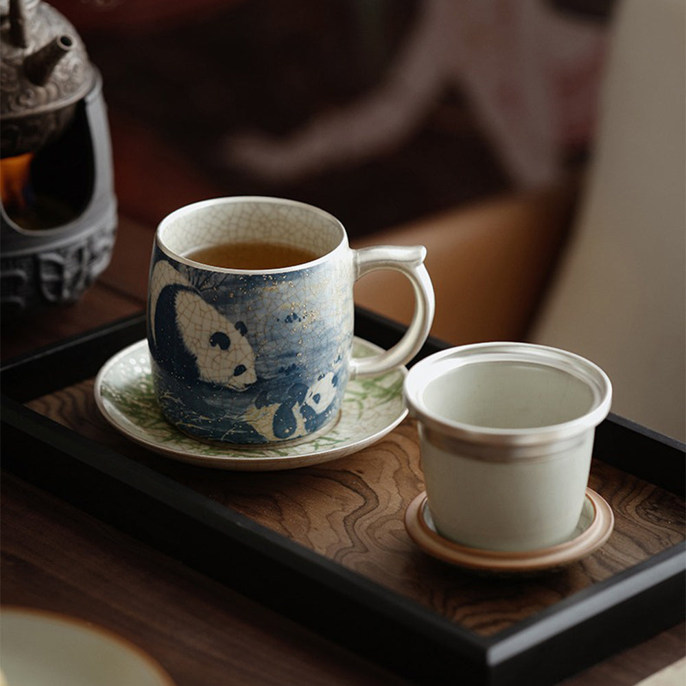 Side view of panda cup showing ergonomic handle and lid design