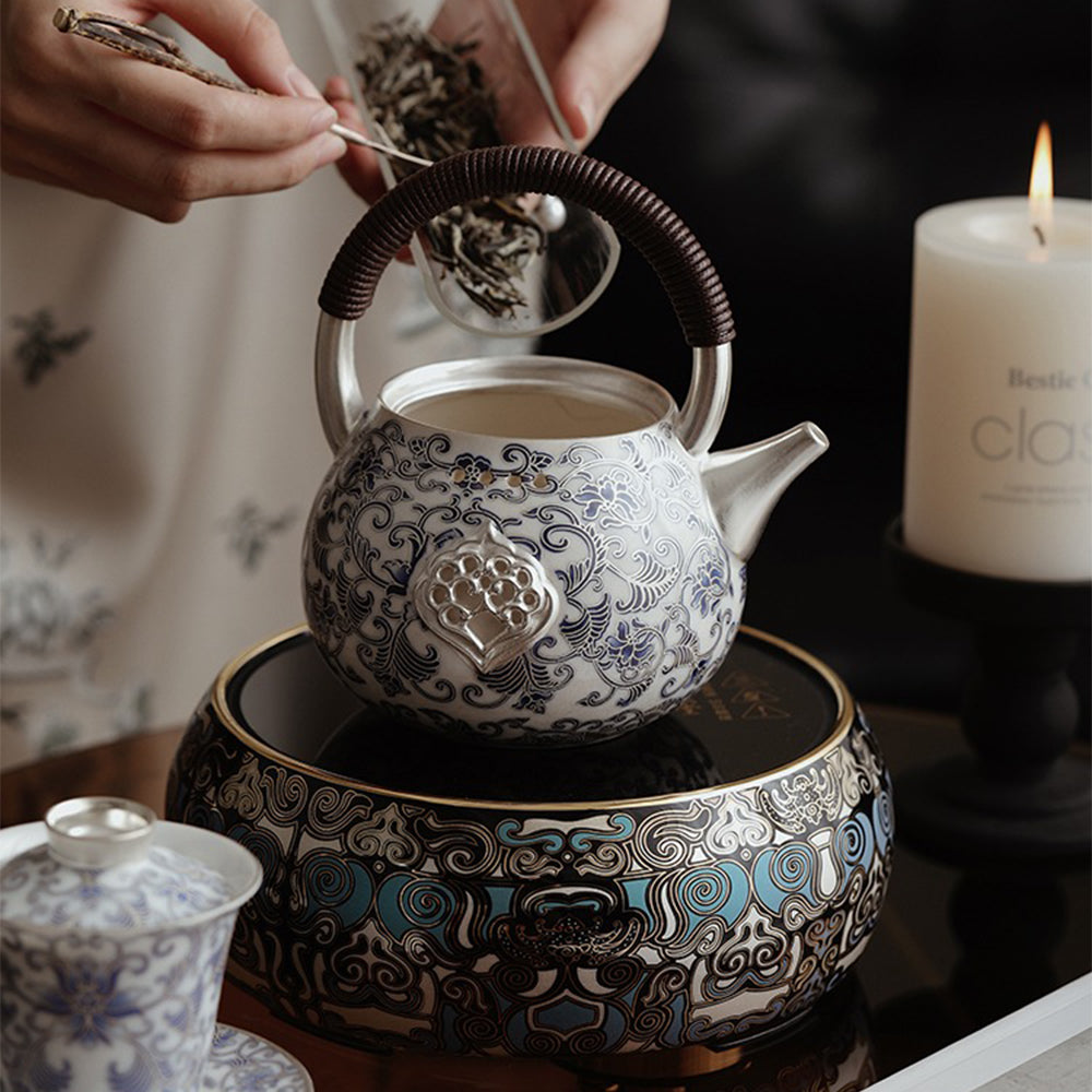 Elegant porcelain teapot with a sturdy handle and beautifully wrapped gift box, perfect for gifting