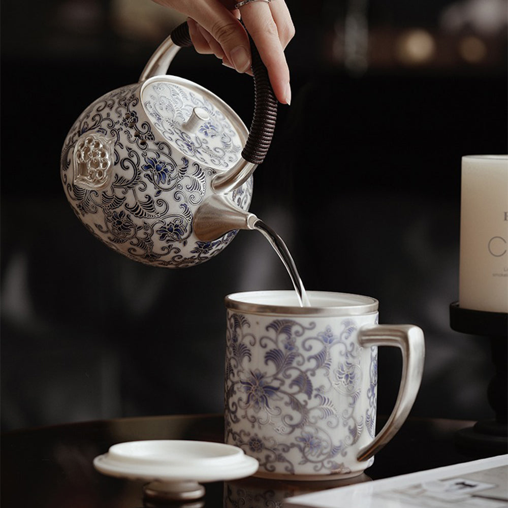 Side view of traditional Chinese teapot with silver plating on lid and spout, ideal for tea lovers