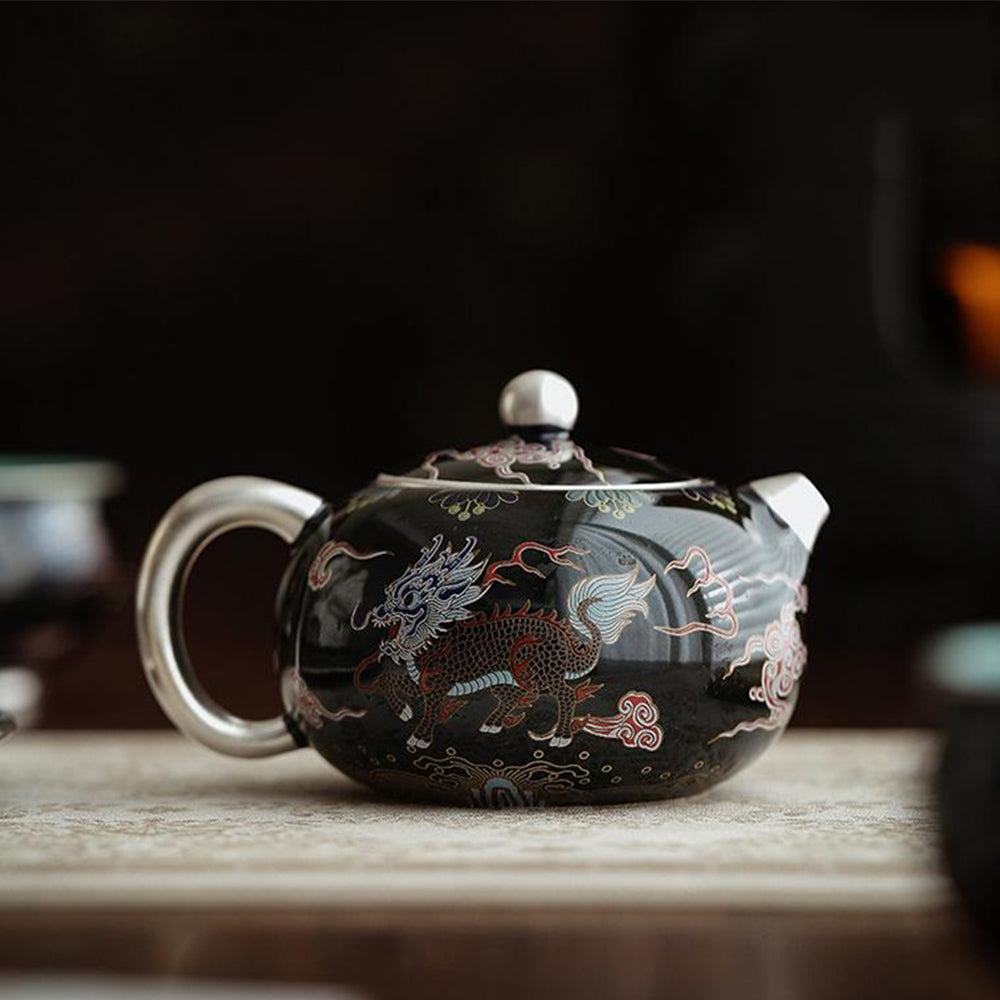 Close-up of the silver-plated interior of the teapot, highlighting its antibacterial properties.