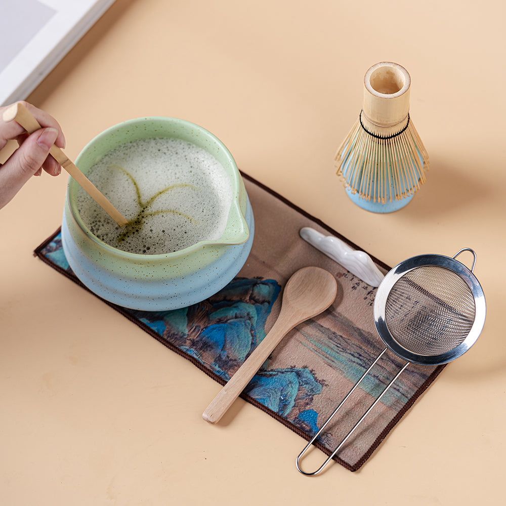 Complete Japanese matcha tea set with all accessories beautifully arranged.