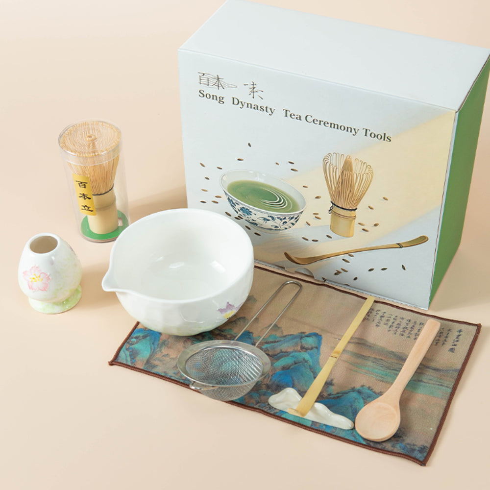 Close-up view of the elegant matcha tea bowl with floral and butterfly designs