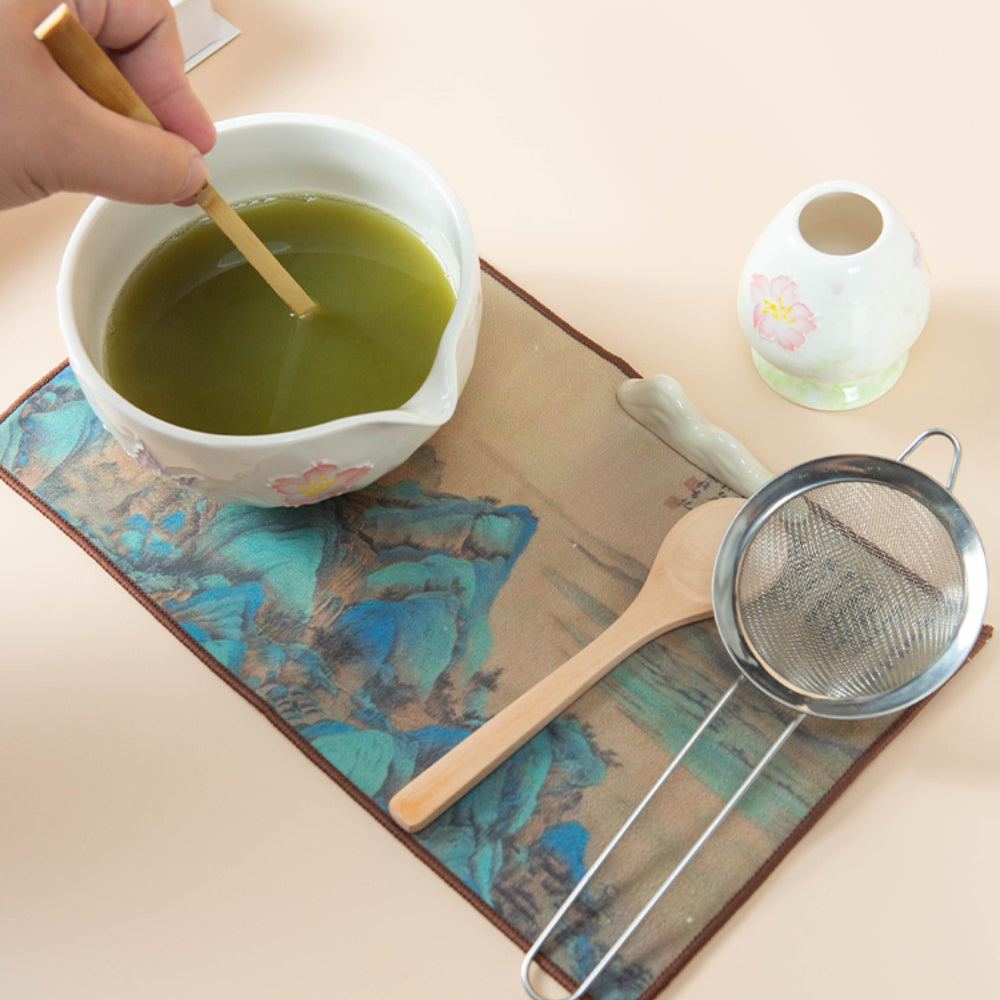 Complete colorful matcha tea set displayed with all accessories