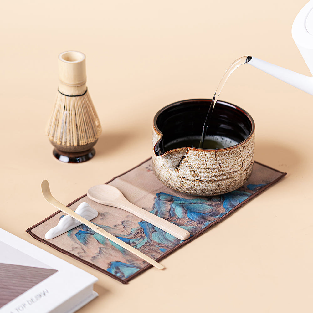 Complete Japanese matcha tea set arranged on a wooden table