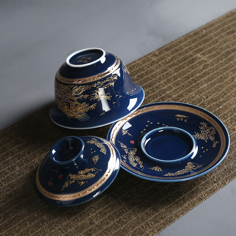 Set of handmade Chinese porcelain tea set with gaiwan, cups, and strainer, ideal for gong fu tea ceremonies
