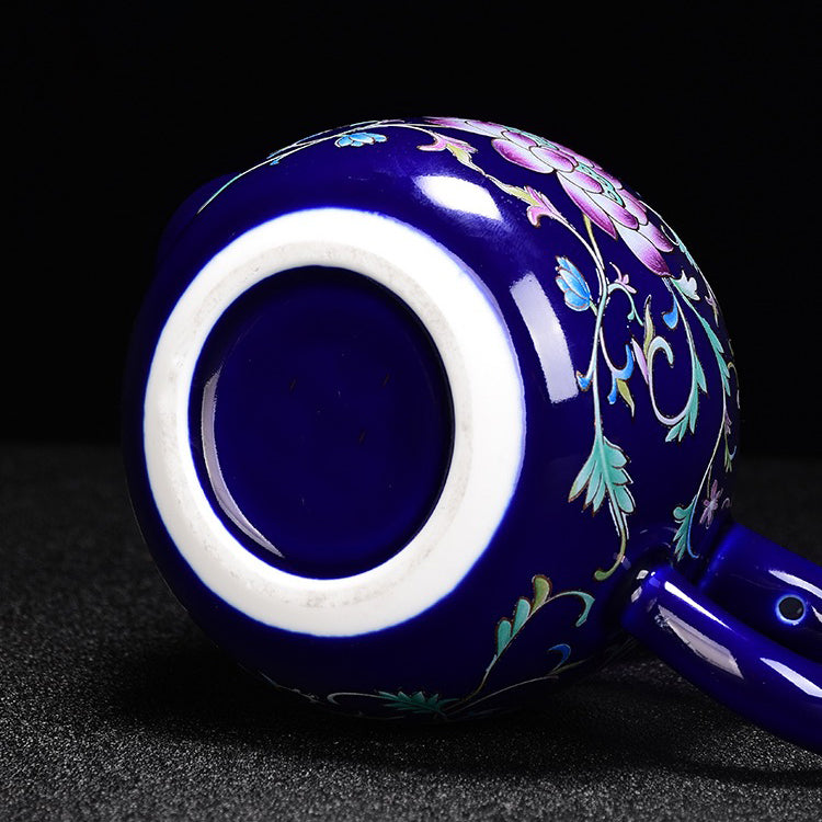 Detailed view of the Jingdezhen enamel tea set with sterling silver for tea brewing
