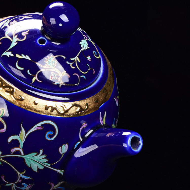 Detailed view of the Jingdezhen enamel tea set with sterling silver for tea brewing