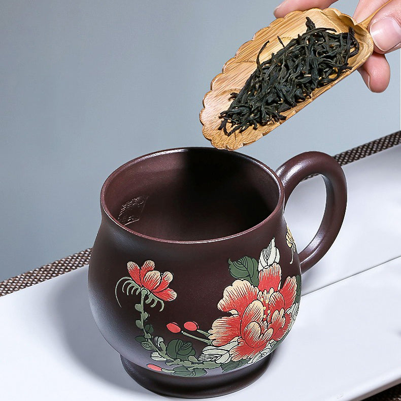 Side view of Yixing purple clay teacup with gourd-shaped lid, highlighting craftsmanship