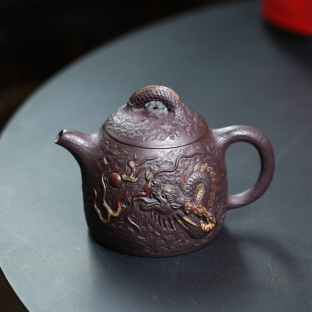Top-down shot highlighting the teapots lid and handle design