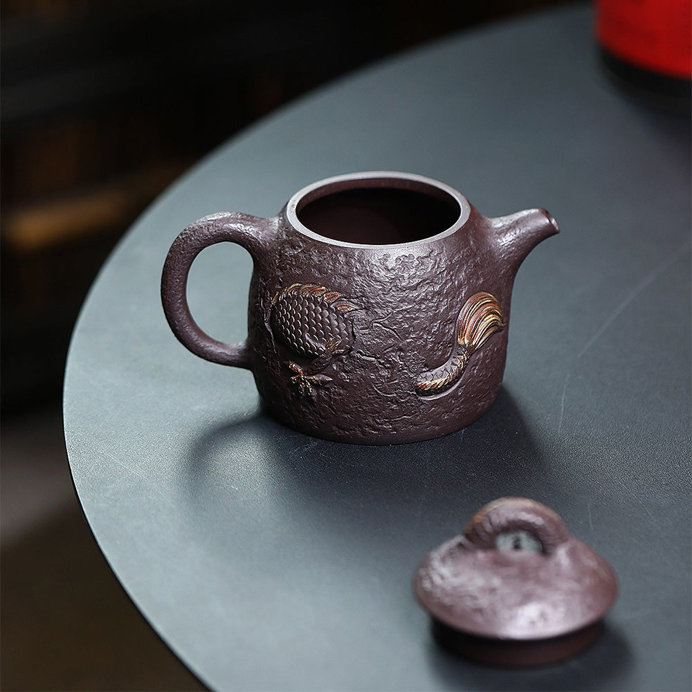 Top-down shot highlighting the teapots lid and handle design