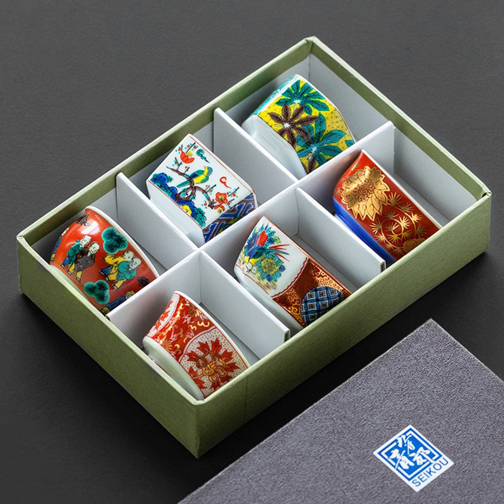 Elegant Japanese Kutani tea cup set displaying vibrant colors and intricate patterns.