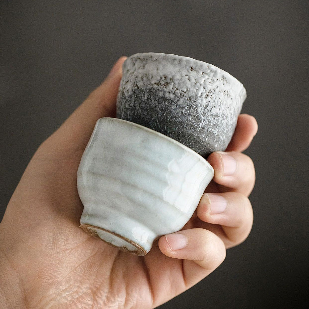 Artistic angle of a single Wango-yaki tea cup featuring traditional Japanese pottery design.