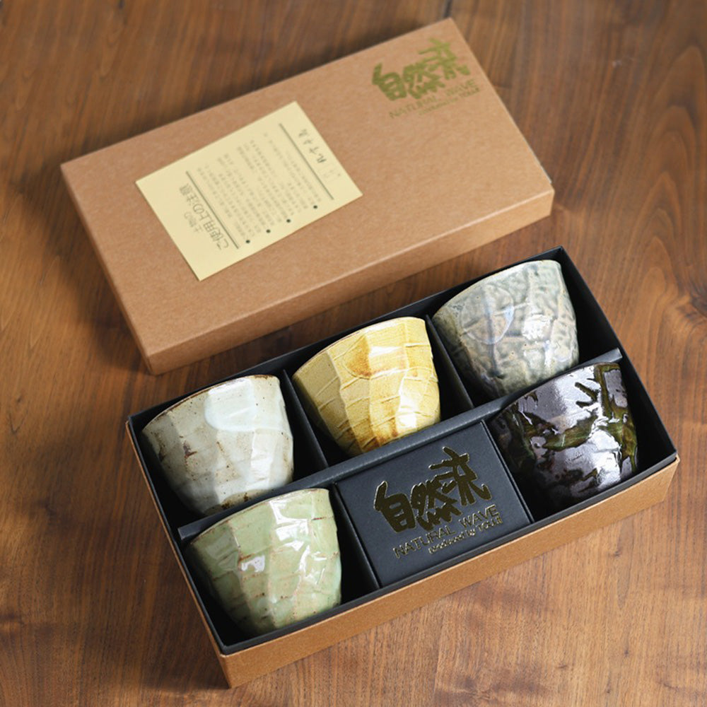 Handmade Seto-yaki tea cup set featuring unique textures and designs.