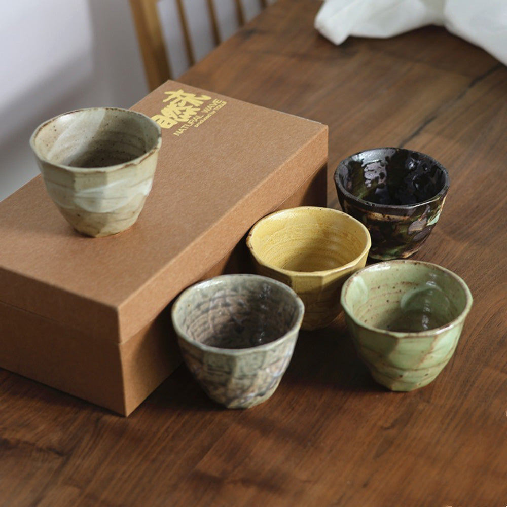 Handmade Seto-yaki tea cup set featuring unique textures and designs.