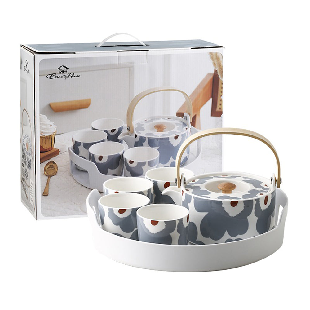 Teapot of the Charming Floral Ceramic Tea Set showing vibrant floral patterns.