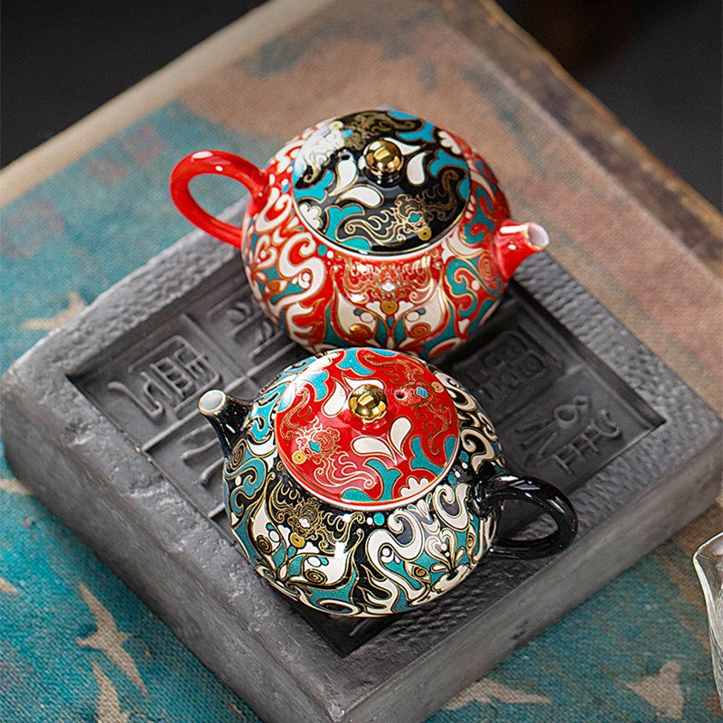 Elegant tea set with red glaze and transparent cups for a premium tea experience