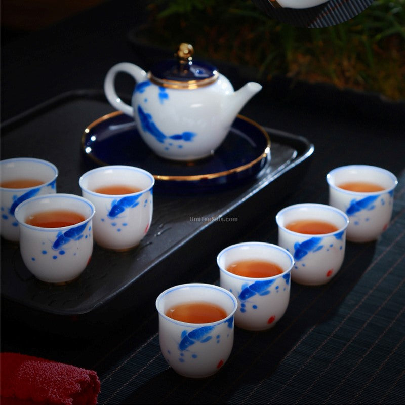 Tea set with goldfish motif in use during a traditional Chinese tea ceremony
