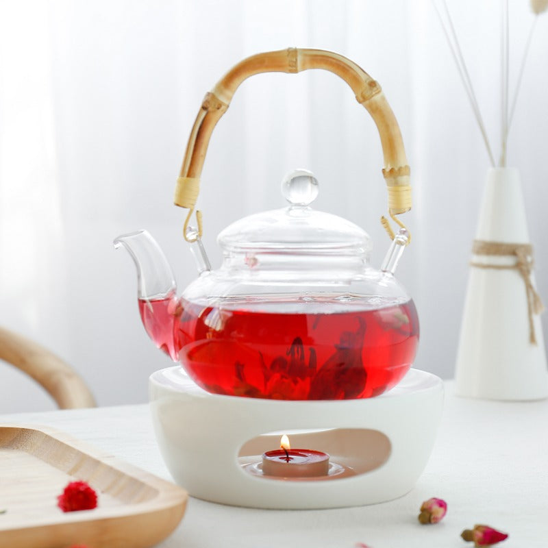 Close-up of elegant porcelain warmer, highlighting its intricate design.
