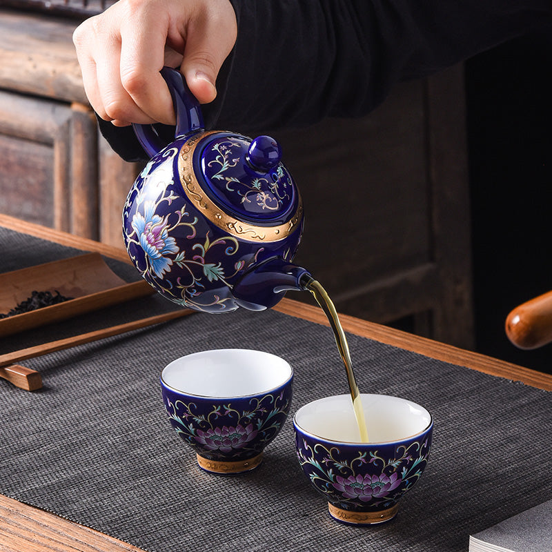 Jingdezhen premium enamel tea set showcasing floral patterns and sterling silver interior