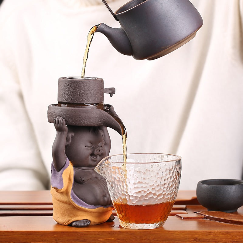 Close-up of tea filter in use during Gongfu tea ceremony with loose leaves