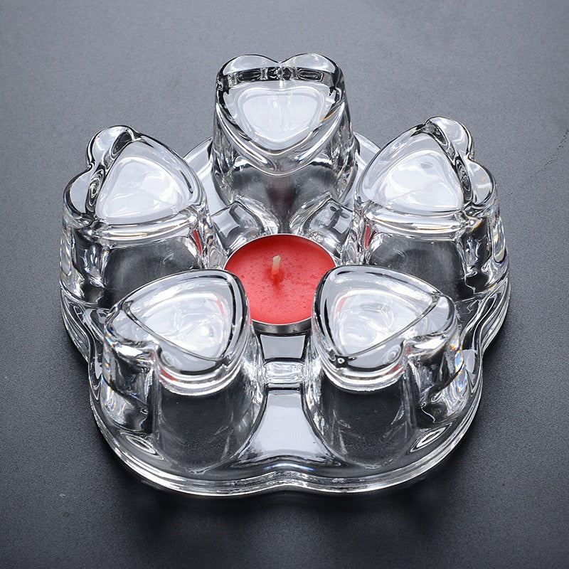 Stylish heart teapot candle warmer displayed on a kitchen countertop, perfect for enhancing your tea experience.