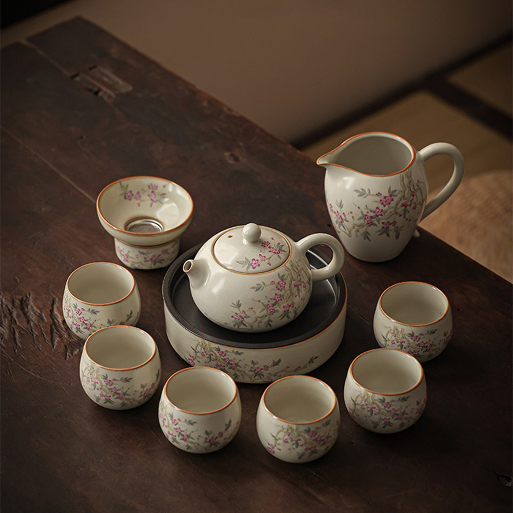 Close-up of the teapot from the Peach Blossom Ru Yao Tea Set, showcasing its jade-like finish and artistic design.