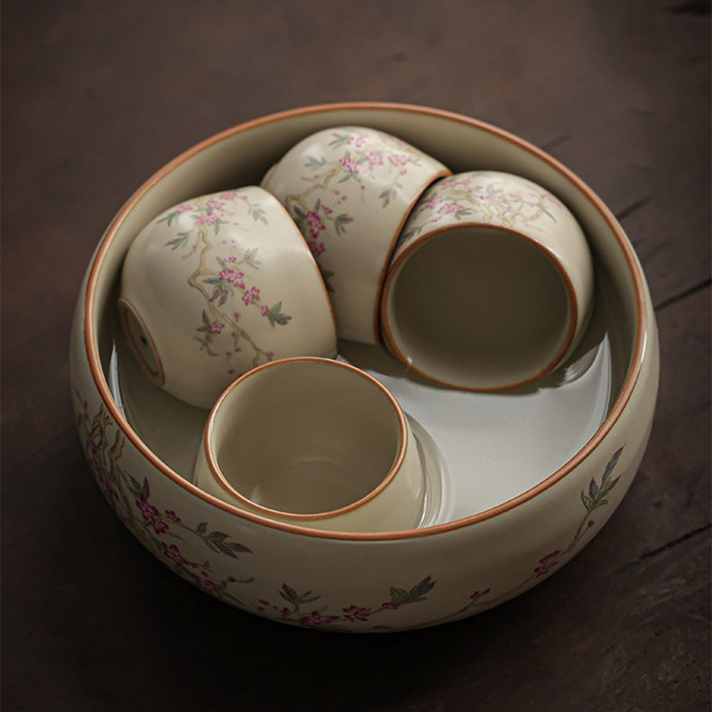 Close-up of the teapot from the Peach Blossom Ru Yao Tea Set, showcasing its jade-like finish and artistic design.