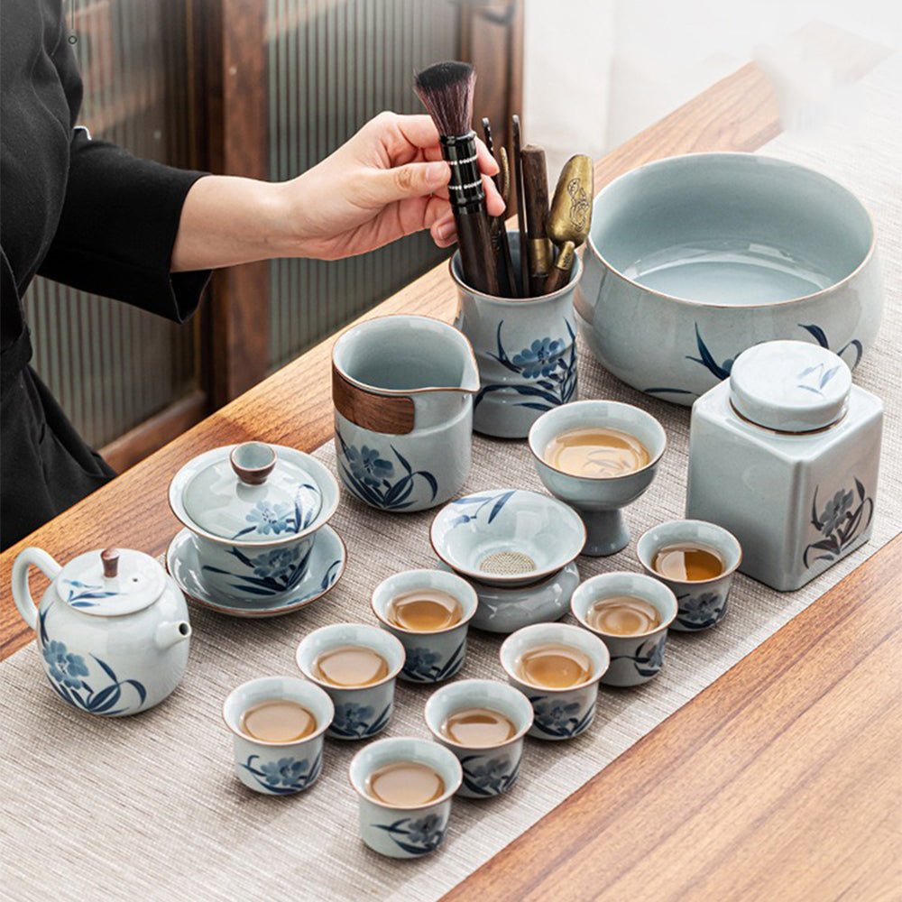 Elegant bamboo-patterned tea set displayed on a wooden tray for gifting