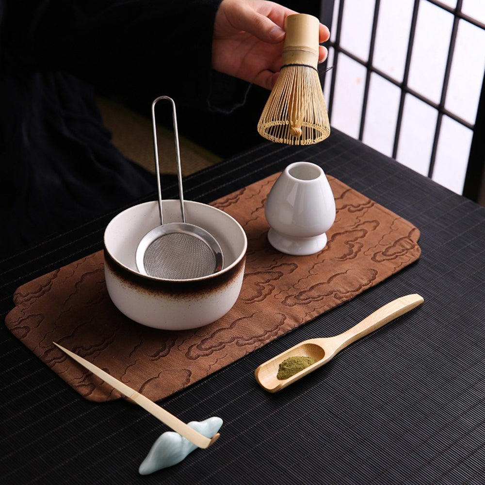 Close-up of the handmade bamboo whisk included in the matcha set, ideal for creating smooth matcha.