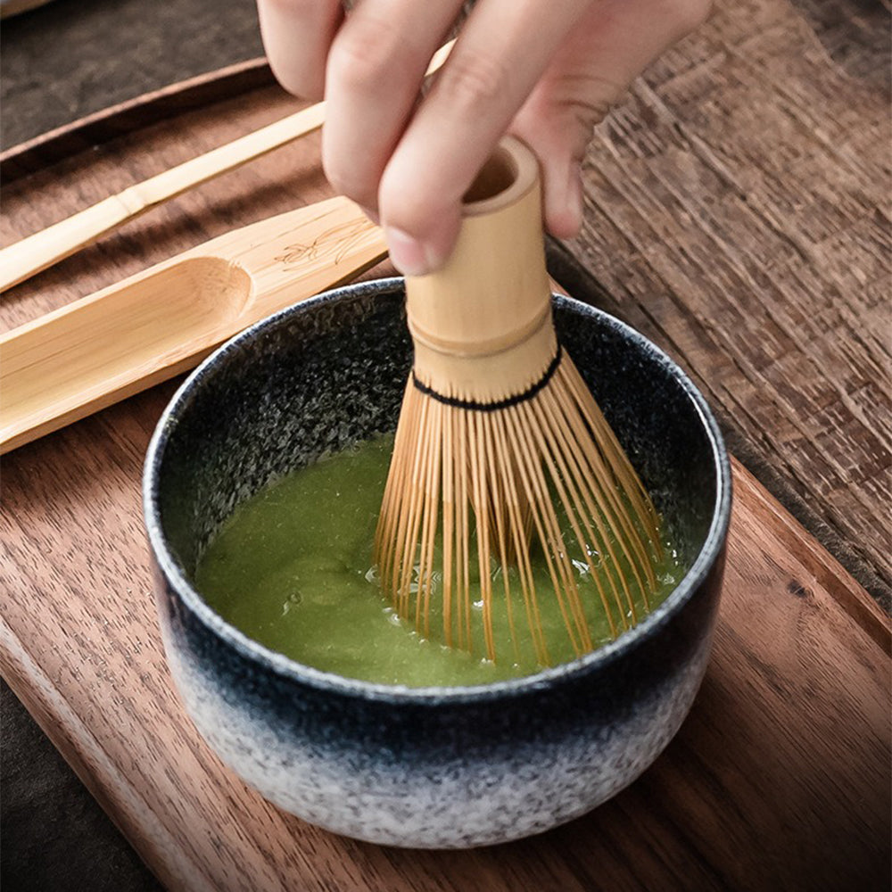 Complete matcha tea ceremony kit with all components arranged for a traditional tea experience.