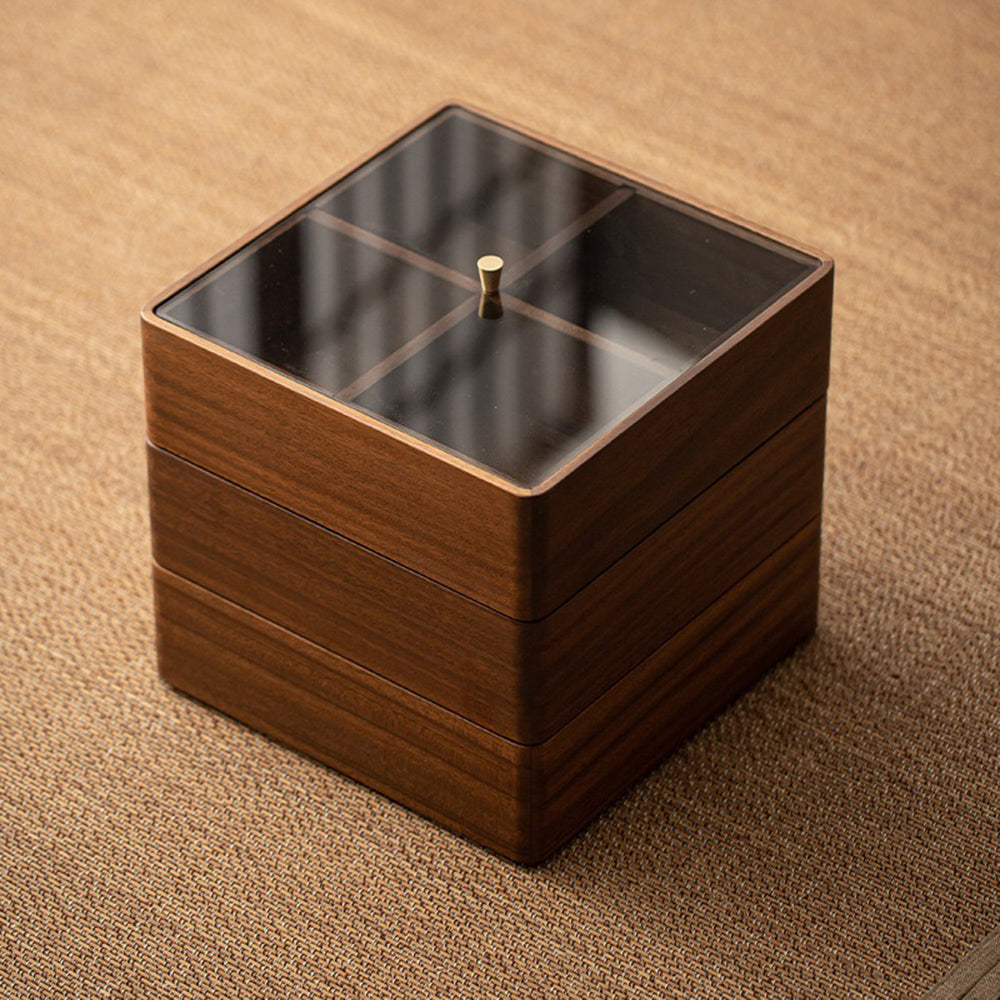 Front view of walnut wooden tea storage organizer showing multiple compartments