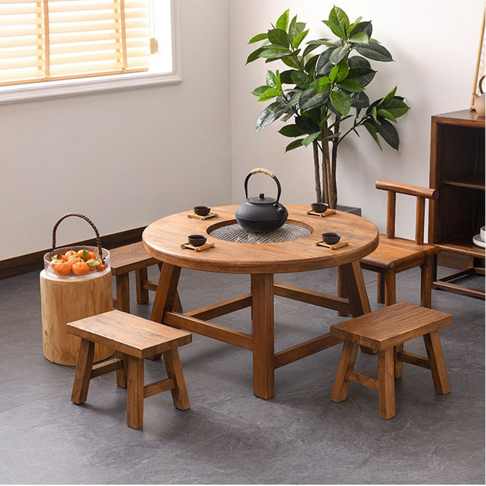 Cozy setting featuring the retro tea table with barbecue function and chairs.