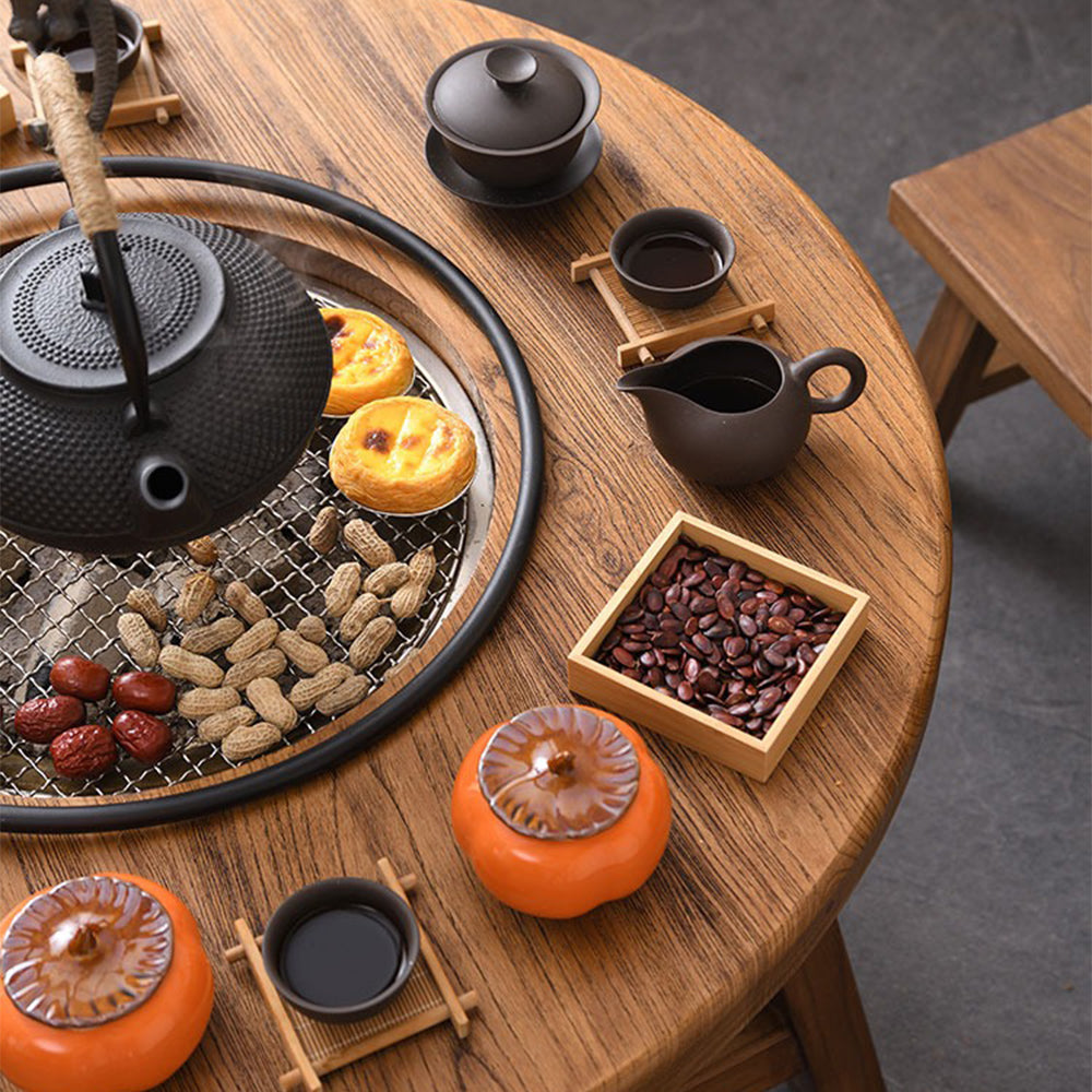 Vintage elm wood tea table with electric stove from an angle, perfect for tea time.
