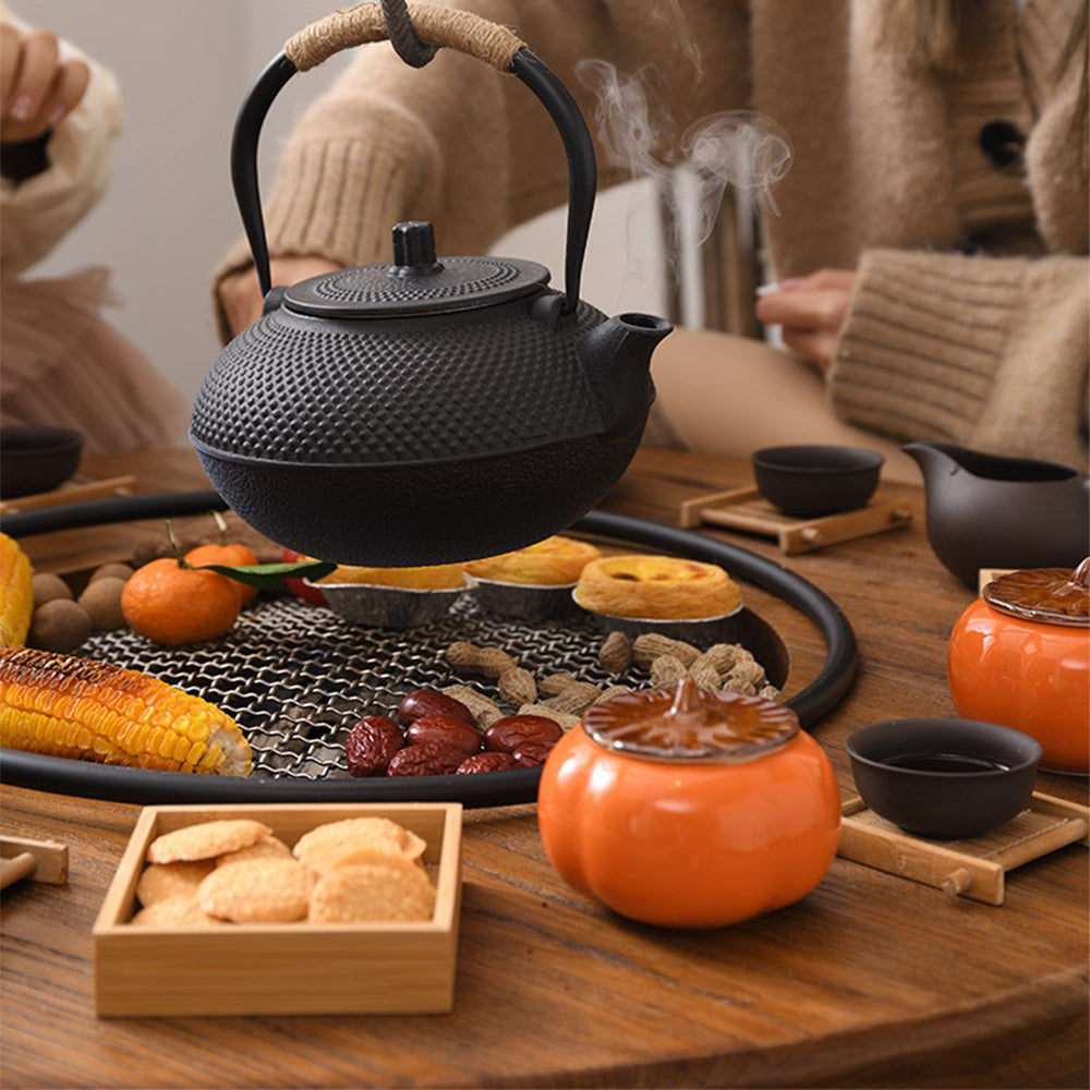 Cozy setting featuring the retro tea table with barbecue function and chairs.