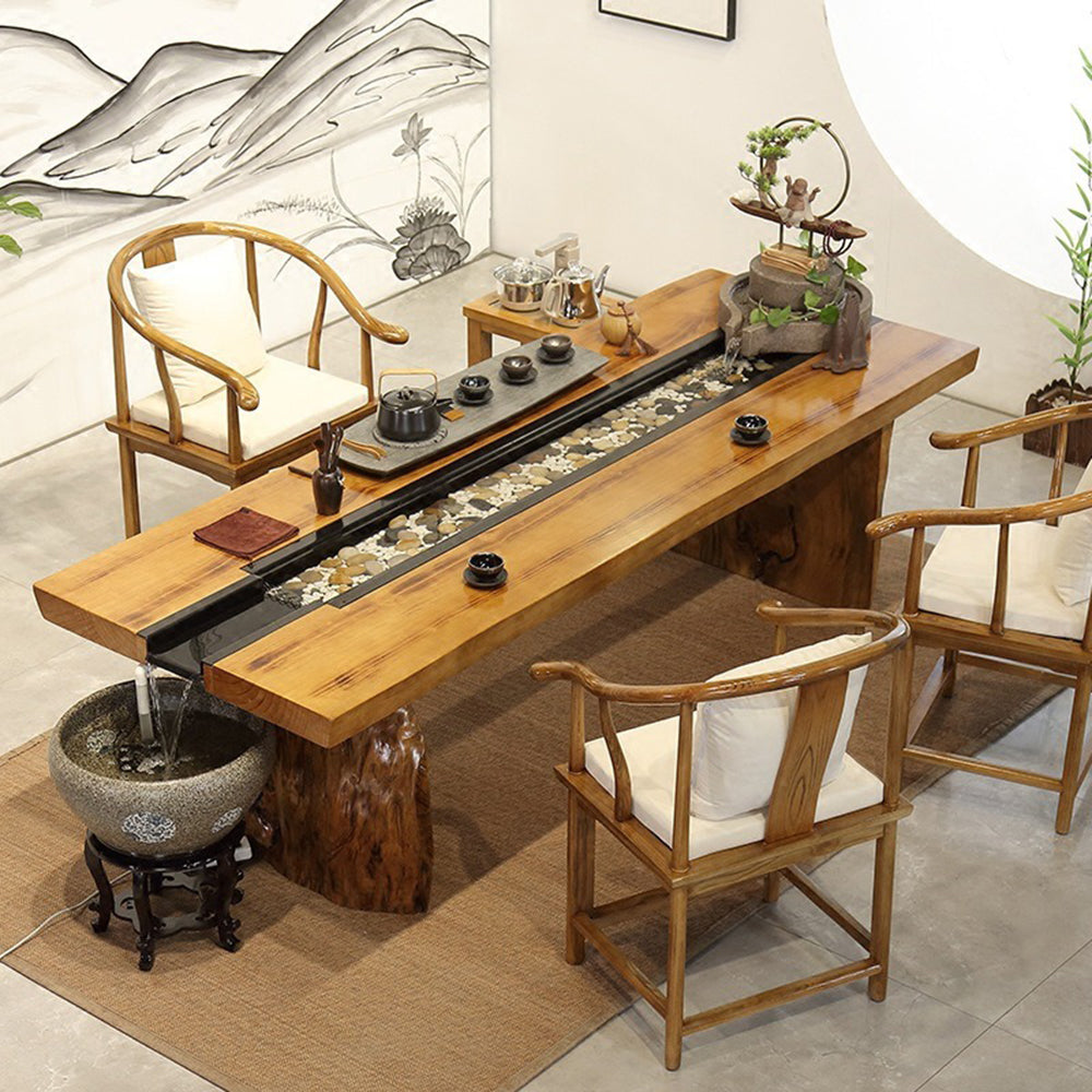 Close-up of the circulating water feature on a Chinese wooden tea table