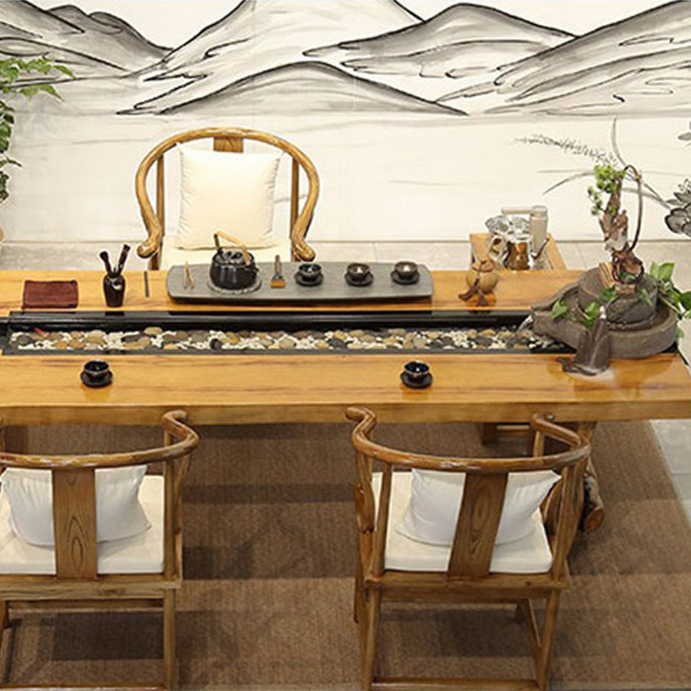 Close-up of the circulating water feature on a Chinese wooden tea table