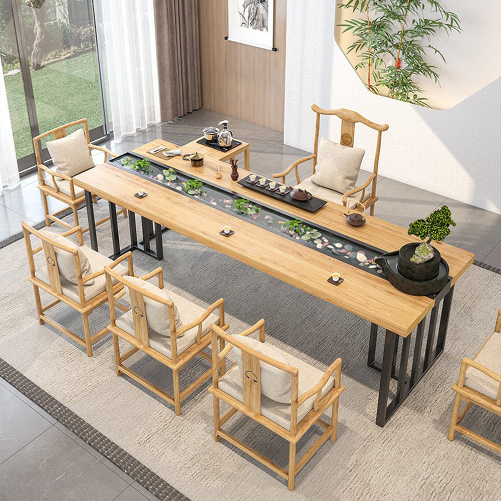 Chinese landscape tea table with flowing water and fish pond, elegant and traditional design