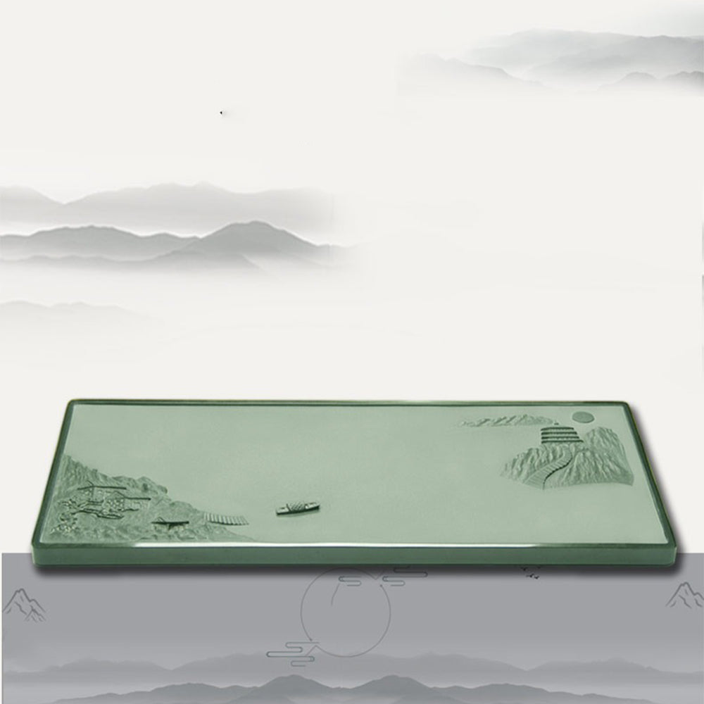 Side view of the hand-carved stone tea tray with drainage outlet for tea ceremonies