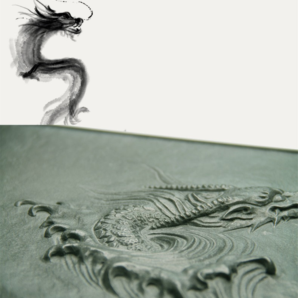 Detailed view of the Majestic Dragon Relief Gongfu Tea Tray highlighting its intricate carvings and textured surface.