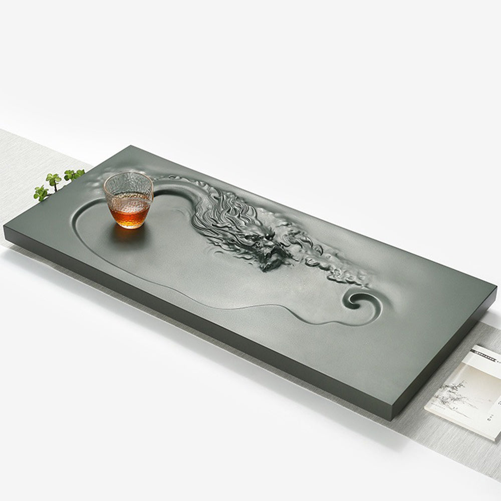 Side angle showcasing the smooth drainage outlet and elegant design of the stone tea tray