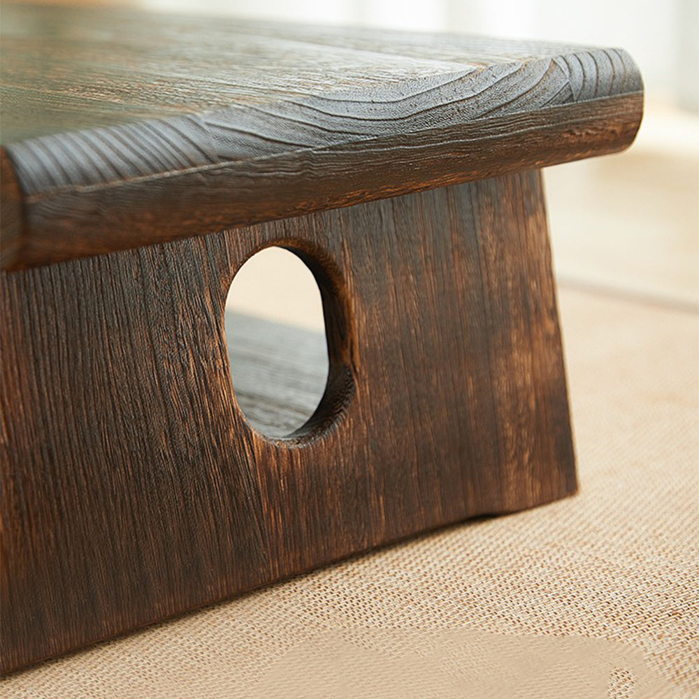 Close-up of the tables polished corner and hinge detail, emphasizing quality and safety.