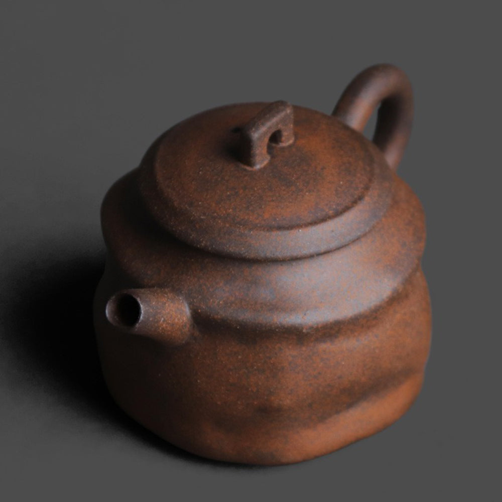 Traditional Chinese handmade clay teapot for loose leaf tea in natural setting