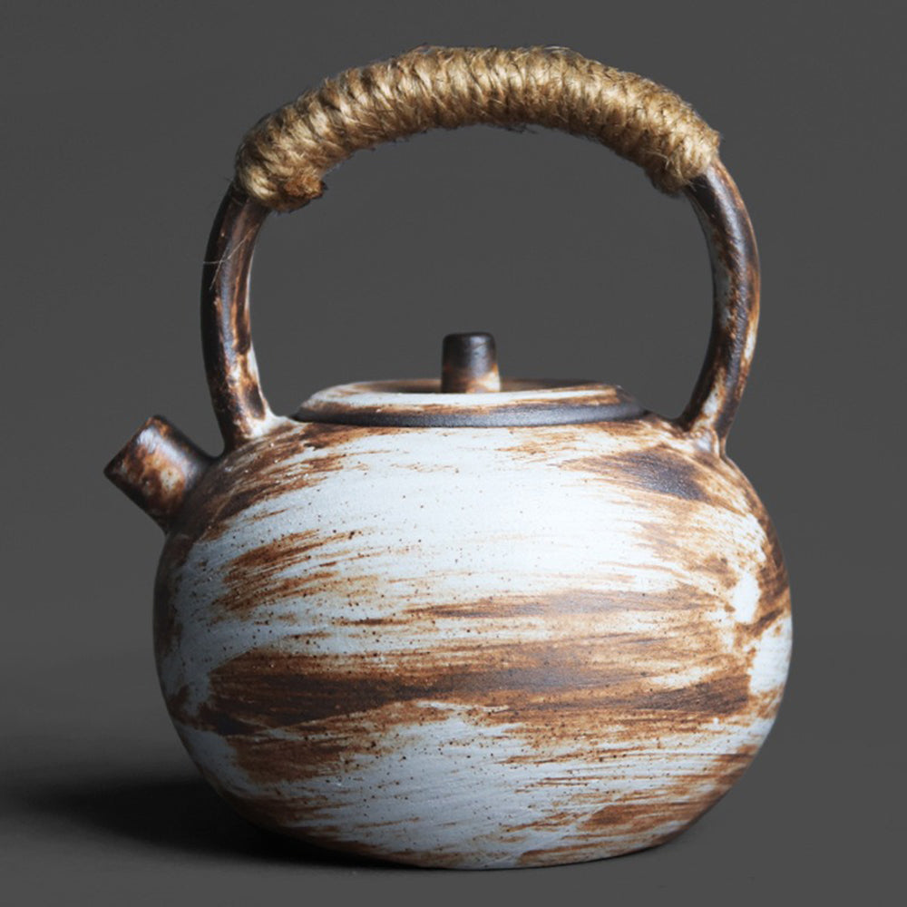 Close-up of the Wabi-Sabi Japanese Artisan Teapot highlighting its unique glaze and texture.