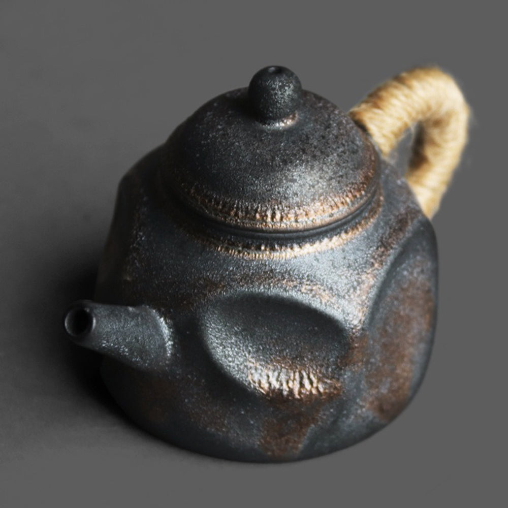 Top view showing the distinctive dent design of the Japanese ceramic teapot